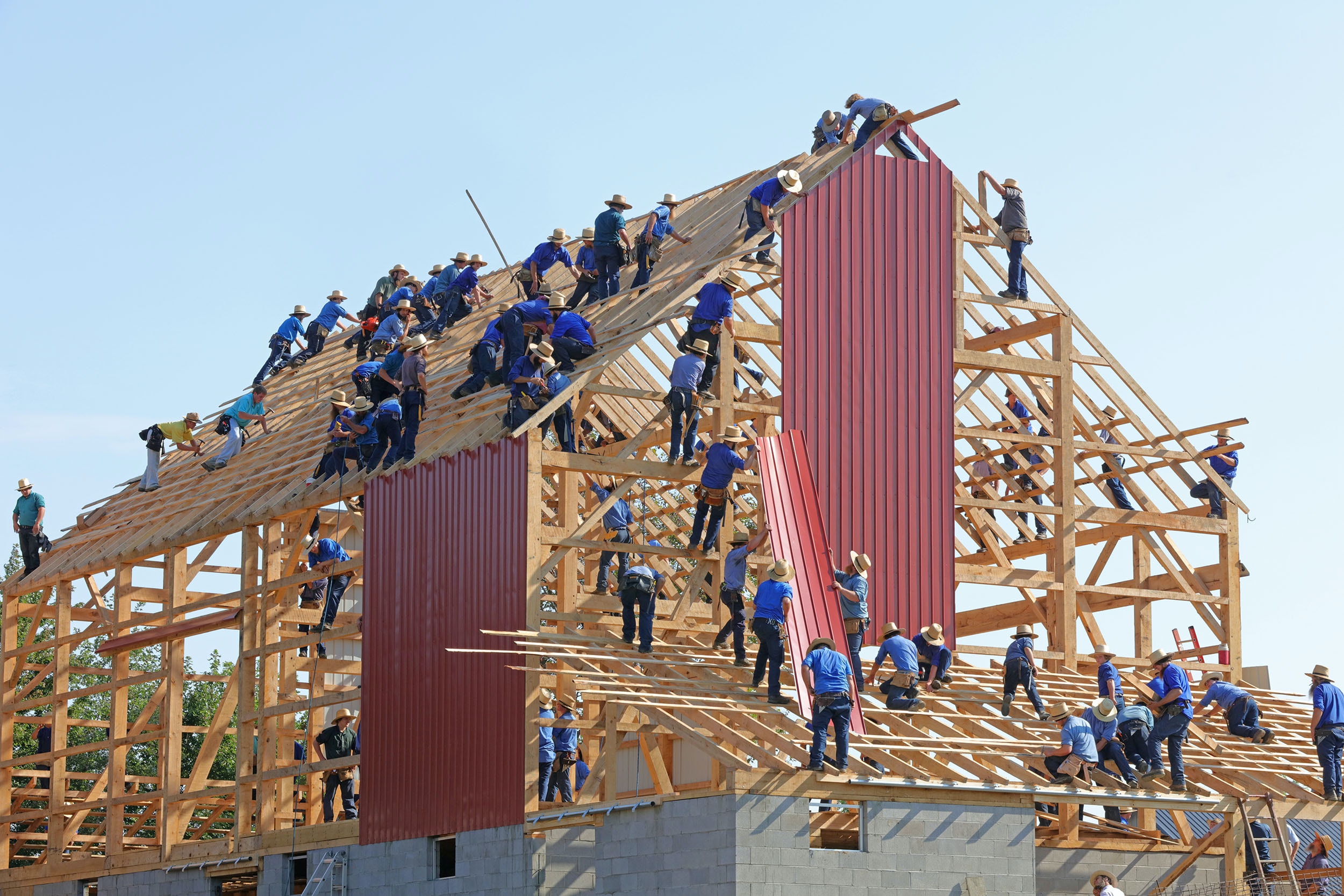 user story - people building structure during daytime
